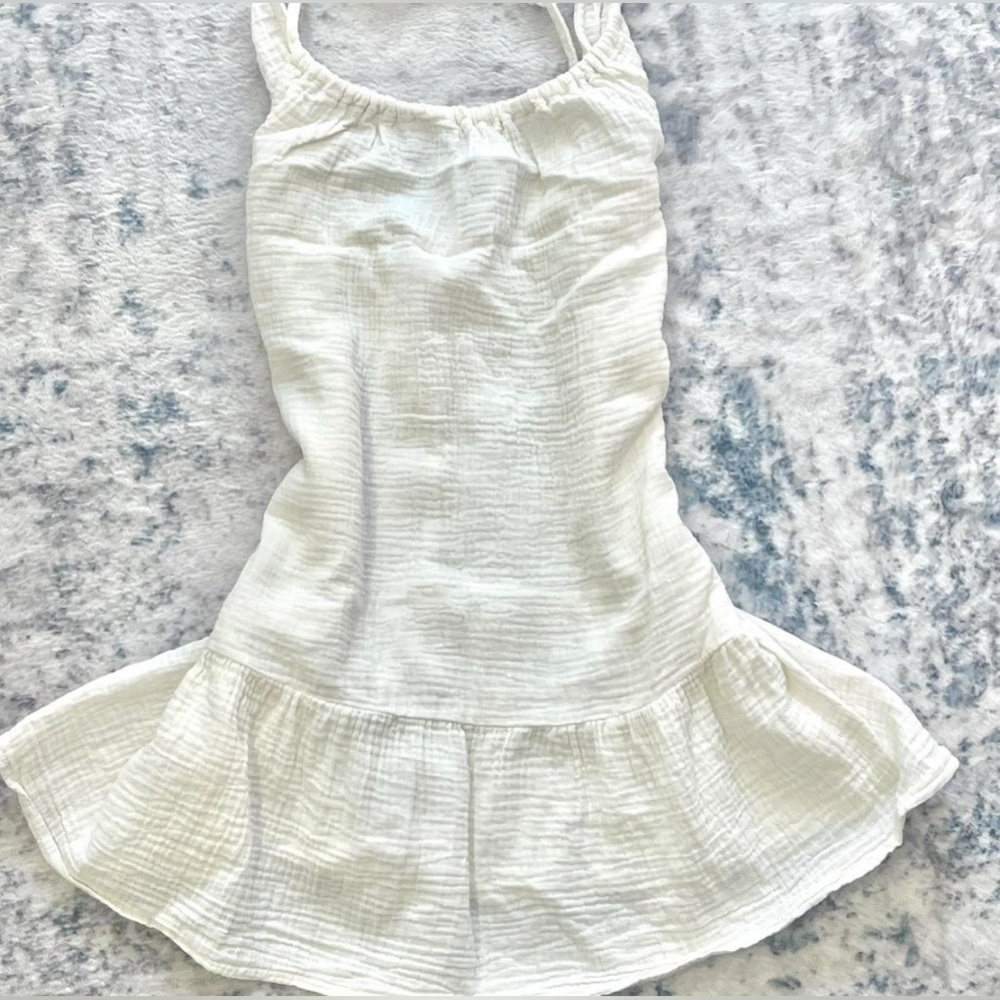 Cream mini dress/top with ruffles